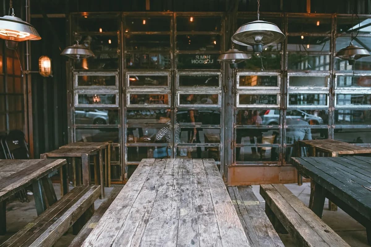 Restaurant interior with wooden tables